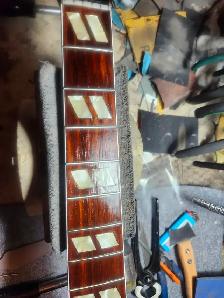 The Guitar Shoppe Calgary fret leveling - Photo 8