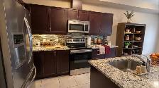 Luxury 4-Bedroom Home with Finished Basement & Garage - Photo 2