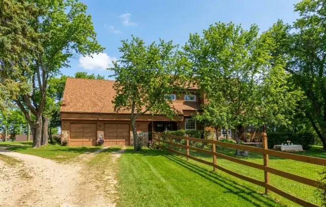 Stunning 2348sqft 3bdrm home w/ 40x80 shop situated on 12  acres