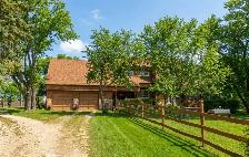 Stunning 2348sqft 3bdrm home w/ 40x80 shop situated on 12  acres