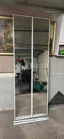 Coat closet mirrored folding doors