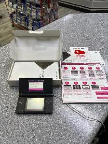 Nintendo DSi system black in box.