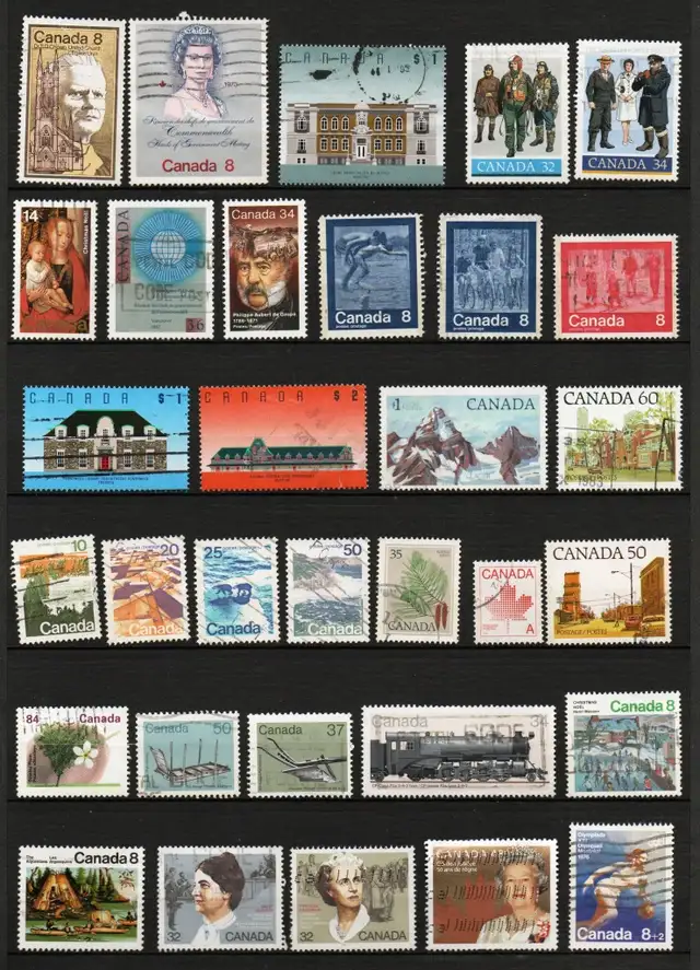 500   Canada & World Wide Stamps on Stock Sheets