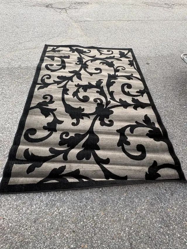 Free delivery used Black and Grey Floral Area Rug