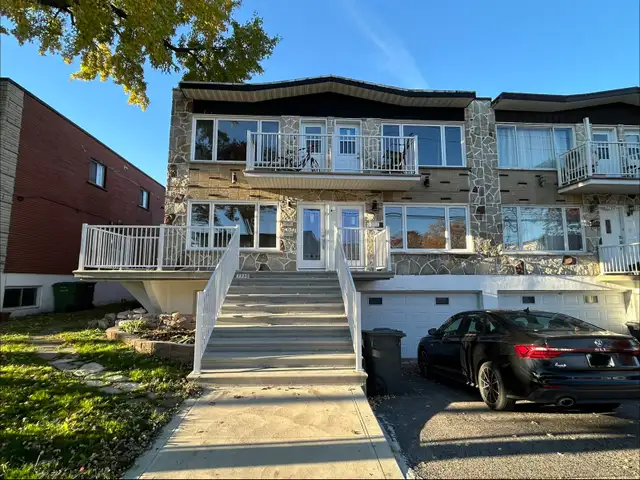 Grand 5 ½ rénové — Cours et Stationnement