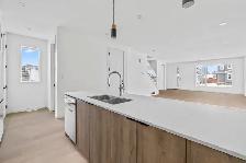 Brand New 4 Bedroom Main floor Unit! - Photo 2