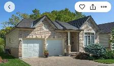 elegant one floor living, overlooking a private ravine