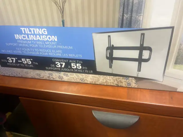 Brand New unopened tilting TV wall mount