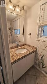 2 BEDROOM TOWNHOUSE FOR RENT IN BURLINGTON · BACKS ONTO RAVINE - Photo 11