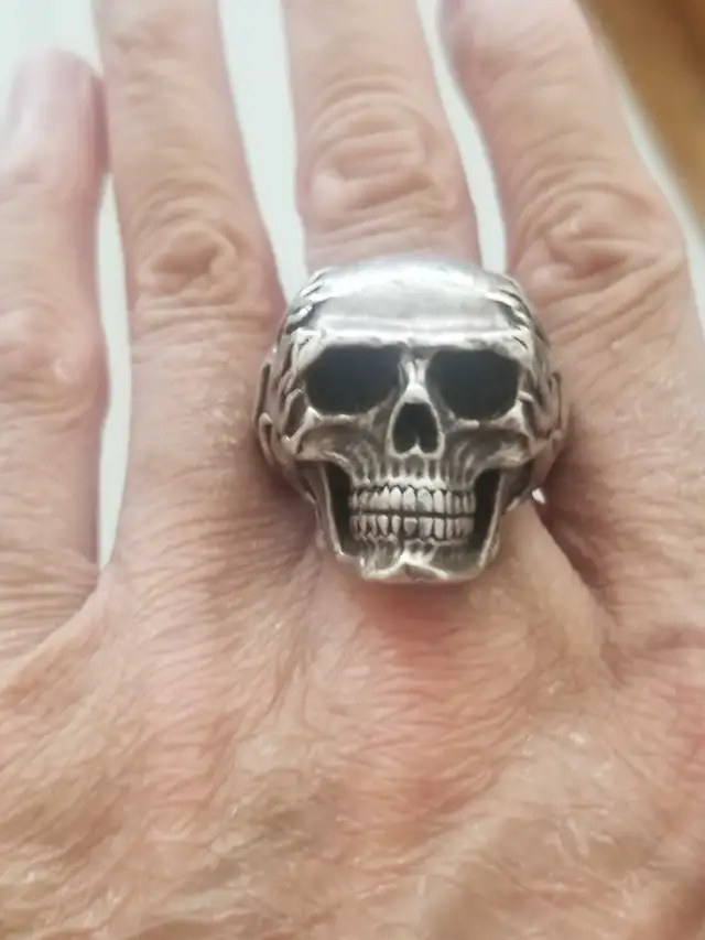 C C Sterling Silver Skull Ring the ring weighs 58G around there