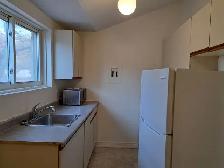 Charming 1 Bedroom   Den | Main Floor & Parking - Photo 2