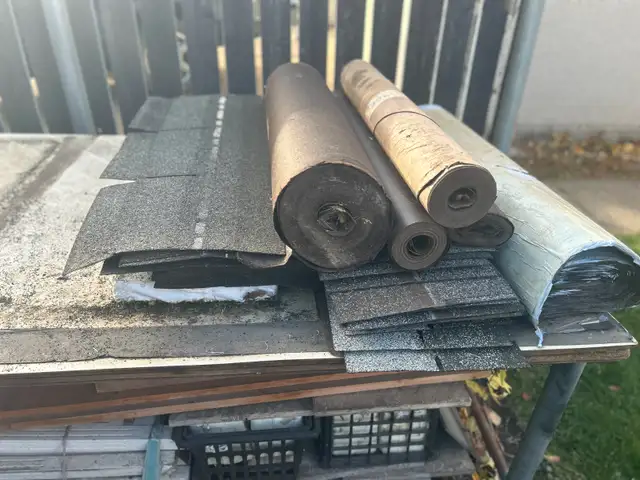 LEFT OVER FROM THE JOB -SHINGLES /PAPER /ECT.