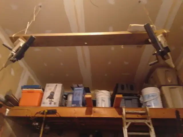 Two manual fishing down riggers, plus cannon balls