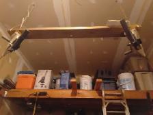 Two manual fishing down riggers, plus cannon balls