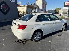 2010 Subaru Impreza 2.5i 4dr Sdn Auto 2.5i - Photo 7