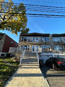 Grand 5 ½ rénové au rez-de-chaussée — Cours et stationnement