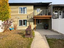 FANTASTIC townhouse for rent in Penhold! Garage & walkout - Photo 5