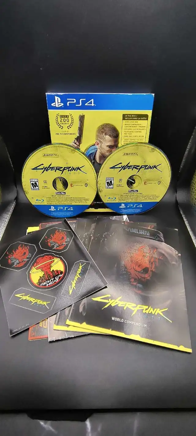 PS4 CYBERPUNK 2077 W/MANUAL & EXTRAS