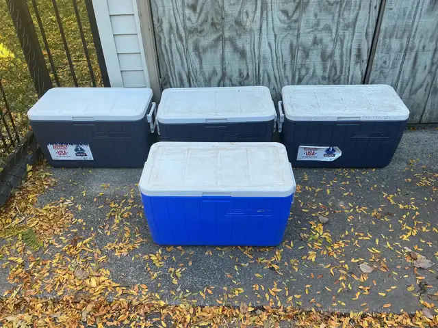 Four COLEMAN Hard Sided Coolers !