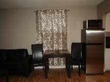Spacious furnished basement suite in North Battleford - Photo 4