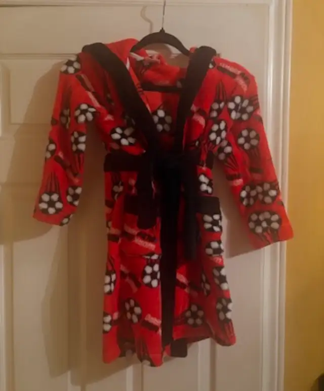 brand new soccer robe. medium