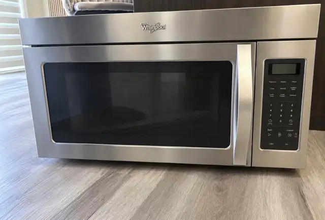 Like New Stainless Steel Whirlpool Over The Range Microwave