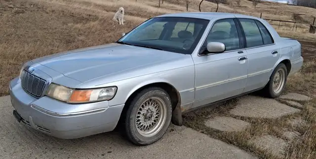 2002 Mercury Grand Marquis LS Premium.  213,000K.