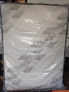 BRAND NEW, STILL IN PLASTIC, MATTRESS & BOXSPRING for sale!