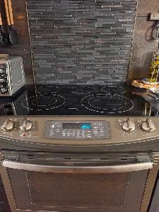 GE Profile Slide-In Electric Range – $150 - Photo 2