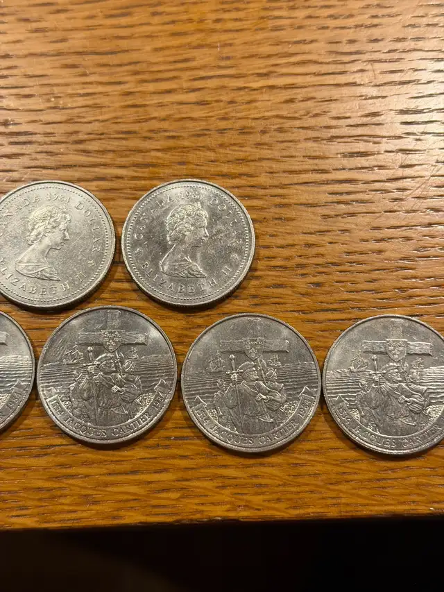 half a roll (9) of 1984  Unc CAN  Cartier 1.00 Coins