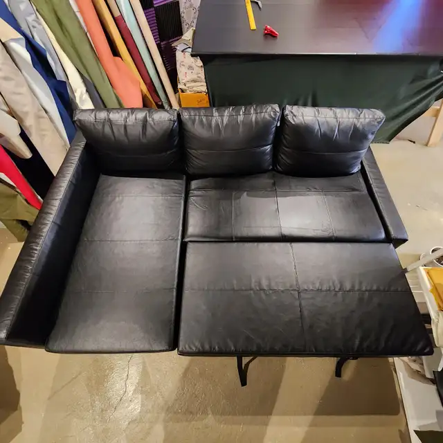 EXCELLENT Black leather IKEA sectional sofa bed   FREE DELIVERY