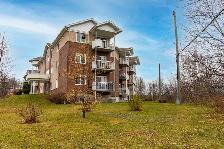 CONDO 4 ½ IMPECCABLE AVEC VUE SUR LE FLEUVE | LÉVISÀ vendre – 2 - Photo 2