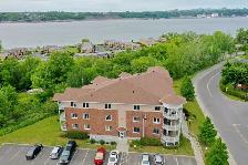 CONDO 4 ½ IMPECCABLE AVEC VUE SUR LE FLEUVE | LÉVISÀ vendre – 2 - Photo 3