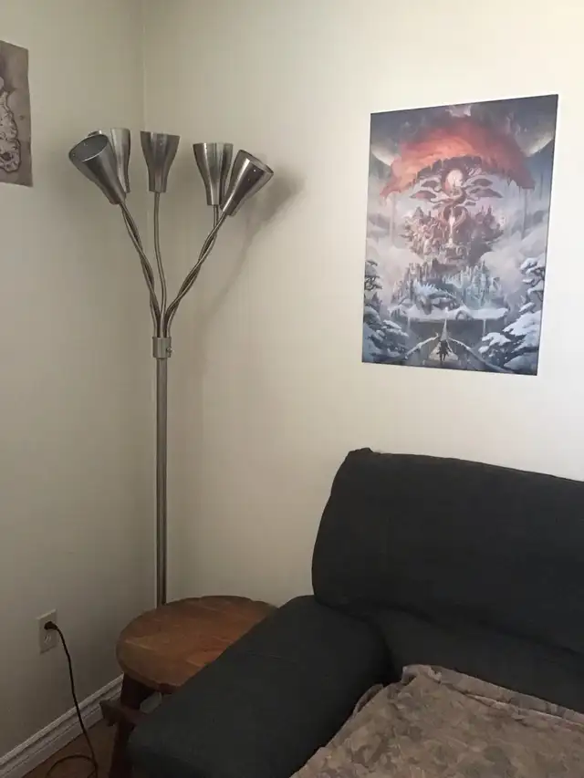 tall silver multidirectional lamp