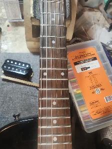 The Guitar Shoppe Calgary fret leveling - Photo 4