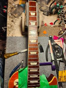 The Guitar Shoppe Calgary fret leveling - Photo 6