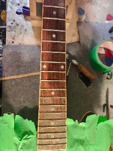 The Guitar Shoppe Calgary fret leveling - Photo 9