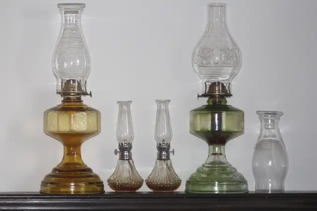 4 oil lamps   extra chimney