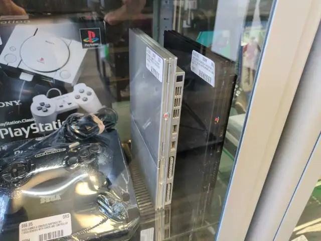 PlayStation 2 systems with one controller