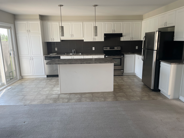 3 bedroom End Unit 2 Storey Townhome with large back yard