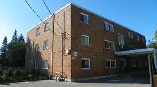 Downtown 2 bedroom close to Queens. Heat, water, parking Incl.