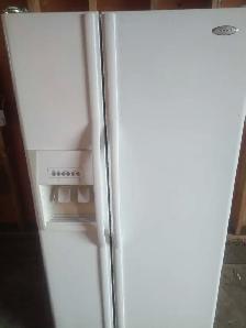 'Whirlpool double door fridge W/ ice maker works Great! CLEAN'