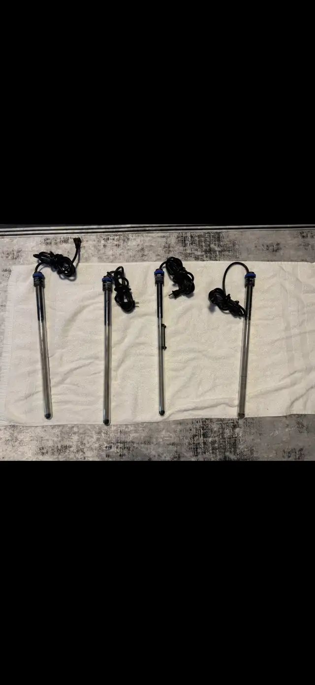 Aquarium accessories, bunch of heaters, decoration rocks, plants