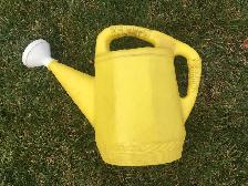 Plastic Yellow Watering Can - $4