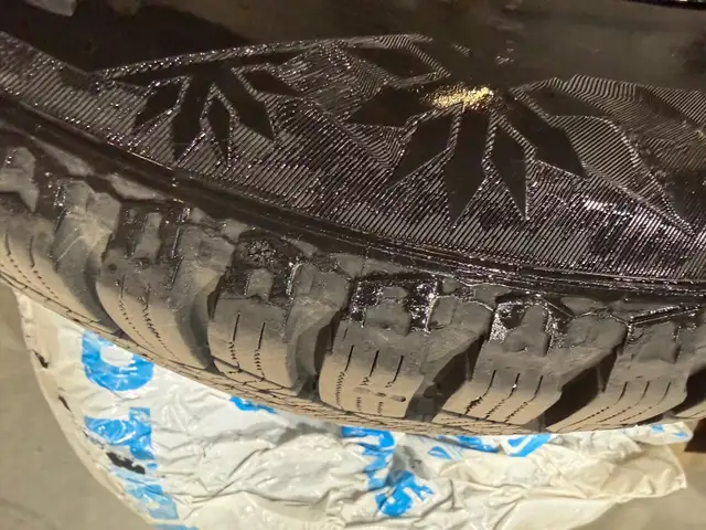 18" Continental Winter Tires on Black mags for BMW X3