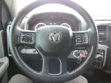 2017 Ram 1500 5.7L V8 4WD Quad Cab 140.5' SLT - Photo 16