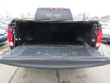 2017 Ram 1500 5.7L V8 4WD Quad Cab 140.5' SLT - Photo 24