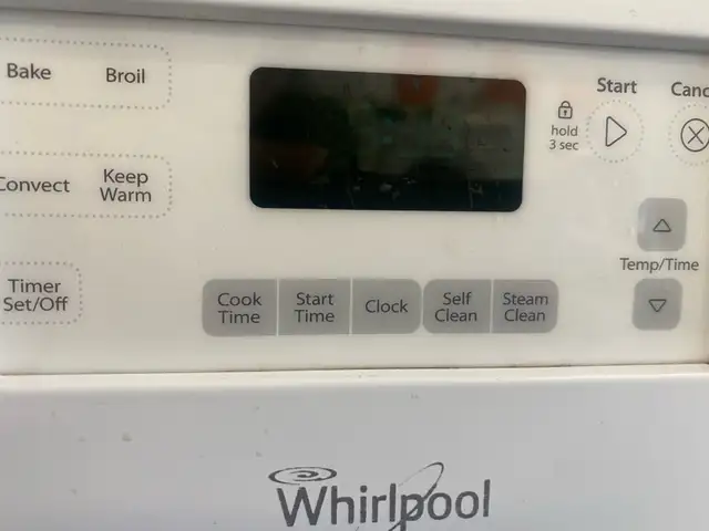 Cuisinière Whirlpool vitrocéramique blanche